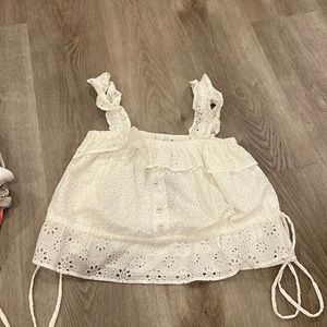 Urban outfitters white eyelet tank w ruffle detailing on sleeves fits like M/L
